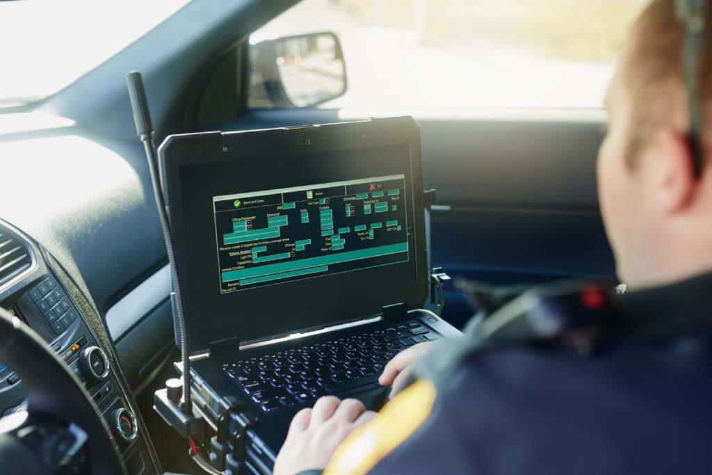 A police laptop screen in a car. 